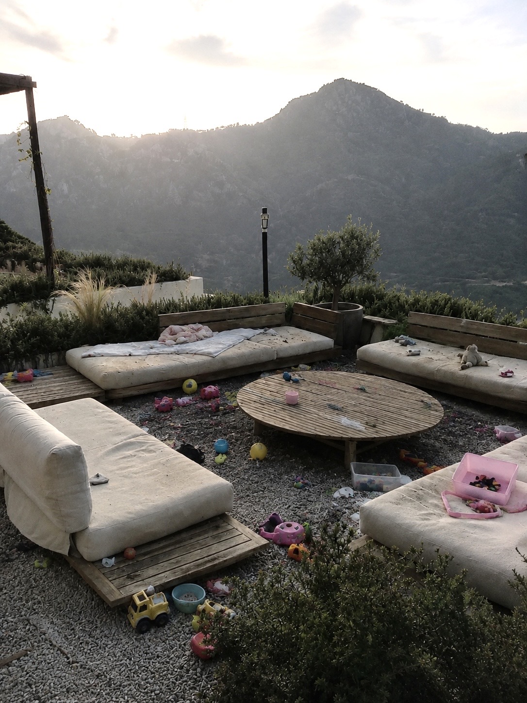 The same terrace as shot on a phone at dusk